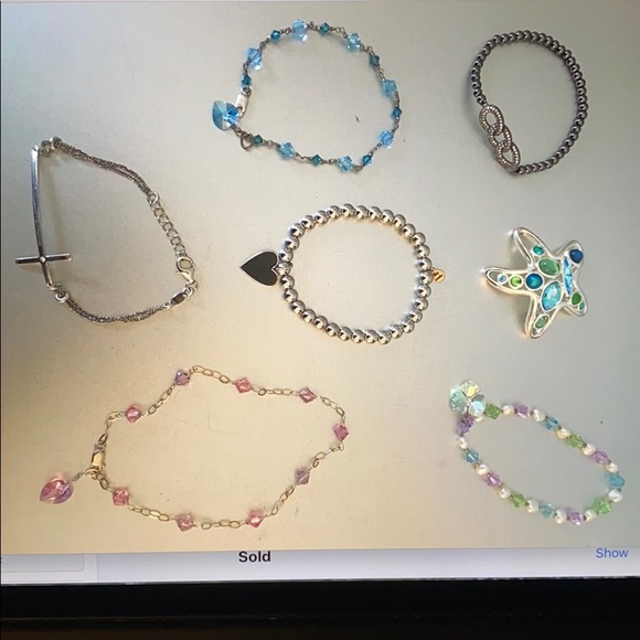 Multiple bracelets (6) and pin-all brand new